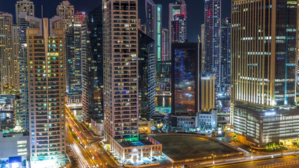 Wall Mural - Fantastic rooftop skyline of Dubai marina timelapse.