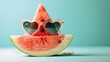 Juicy Watermelon Slice with Heart-Shaped Sunglasses on Turquoise Background