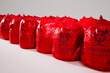 Sealed Red Biohazard Bags Lined Up for Infectious Waste Disposal