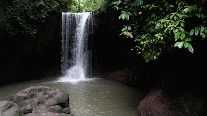 Wall Mural - Tripod shot of Suwat waterfall without tourists. Bali, Indonesia.