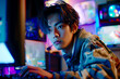 Dynamic Asian Gamer: Streaming Live in Colorful Lighting, Embracing E-Sport Technology from Home