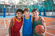 Three Happy Boys on Basketball Court. Kids Play Basketball Game for Fun. School Boys Friendship in Sports Team