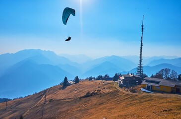 Wall Mural - The glider aircraft over Cimetta Mountain cable car station, Ticino, Switzerland