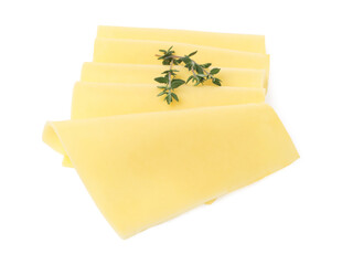 Slices of tasty fresh cheese and thyme isolated on white