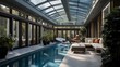 Sleek indoor lap pool and spa enclosure with retractable glass roof lounge space and elegant tile work.