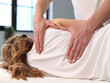 Chiropractic, Osteopathy, and Physiotherapy for Injury Rehabilitation and Pain Relief. Woman Receiving Holistic Healthcare