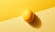 Lemon on a yellow background. Flat lay, top view.