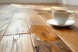 A cup of tea placed on a wooden table.