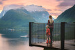 Family vacations in Norway mother and daughter on Bergsbotn viewpoint sightseeing sunset landscape mountains and sea, travel lifestyle outdoor, parent and child exploring Senja island