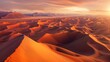 A panoramic view of the Sahara desert, the vast, undulating dunes glowing orange and pink in the low evening light, the endless expanse of sand creating a mesmerizing pattern of light and shadow