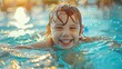 child's joyous expression as they play in the pool.