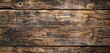 Weathered wooden boards with aged texture, space for text overlay.
