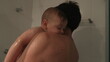 © Marco - Father showering baby son bonding