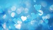 Sparkling blue hearts floating in a dreamy bokeh light background