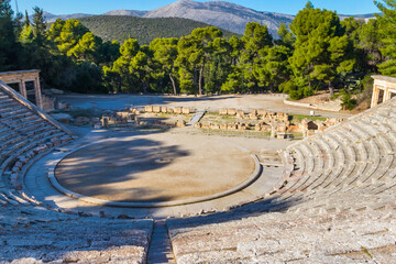 Canvas Print - Ancient Theatre of Epidaurus is theatre in Greek city of Epidaurus, located on southeast end of sanctuary dedicated to the ancient Greek God of medicine, Asclepius in Peloponnese, Greece