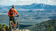 A mountain biker paused at a scenic overlook contemplating the vista.