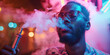 black male vaper smokes a vape and exhales steam in a smoky bar with neon lights