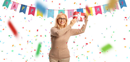 Poster - Happy woman celebrating birthday and holding a present