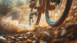 Close-up of a mountain bikes suspension working hard on a rugged trail.
