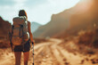 Adventurers Journey: Solo Trekker Embraces the Warmth of a Sunlit Mountain Trail Banner