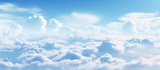 Wall Mural - There is a picture of a sky with clouds with a plane flying through the cloudy sky