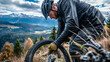Mountain biker fixing a tire on a scenic overlook.