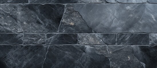 Poster - A close up of a grey rectangular brick wall with a unique pattern, resembling flooring. The monochrome photography highlights the wood, soil, and rock textures