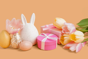 Sticker - Painted Easter eggs with gift boxes, bunny and tulip flowers on orange background