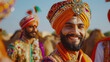Portrait of young sikh male in traditional punjabi colorful dress and turban performing bhangra dance with smile in camel festival with focus