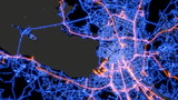 Fototapeta Do przedpokoju - The street map of Saint Petersburg (Russia) consists of blue glowing neon lines on a black background. Top view of the city center with the road network. The border of water and land.