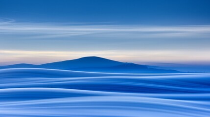 Wall Mural -  a view of a mountain in the distance with a blue sky in the foreground and a blue sky in the background.