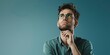 © Brian - Confused man pondering the answer to his problematic questions