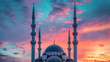 The minarets and domes stand tall against the colorful sky.
