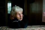 Fototapeta  - A psychological portrait of an older woman.
