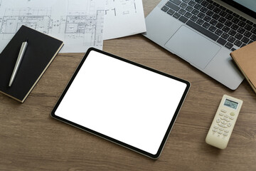 Poster - A businessman holds a mockup. digital tablet with blank screen Mockup Smart home control technology