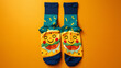 a pair of socks with colorful cute design