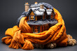 model of a private residential knitted colored house with a warm scarf on the table. the concept of warmth and comfort in the home. construction and architecture