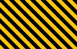 Fototapeta Londyn - Warning yellow black diagonal stripes line. Safety stripe warning caution hazard danger road vector sign symbol.