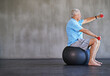 Elderly man, dumbbells and exercise with ball for fitness, wellness and physiotherapy at gym on mockup space. Senior person, weightlifting and training for physical therapy, muscle or body health