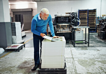 Poster - Printing, factory and mature man with paper for quality control, design or product inspection. Warehouse, print workshop and person for logistics, manufacturing and industrial production in workshop