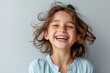 Laughing child with curly hair portrait