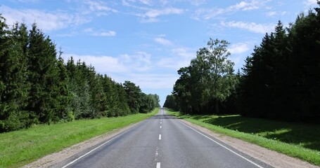 Wall Mural - narrow paved road in summer, paved road in sunny weather