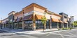 A modern, versatile space for sale or lease in a diverse building featuring both retail and office options, complete with an awning.