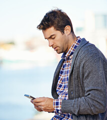 Poster - Man, phone and texting at harbor on mobile network by sea for typing, contact or reading outdoor. Person, smartphone and click at urban port in city for notification, app or social media in Cape Town