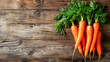 Fresh carrots on the wood background