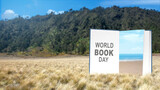 Fototapeta Sawanna - World book days concept, an open book with clear picture  on a book and beautiful landscape view as background.
