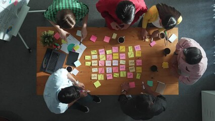 Poster - top view of diverse business team putting hand together and clapping hand while brainstorming market