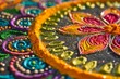 Detailed view of a colorful embroidered object resembling a traditional rangoli design