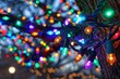 Closeup view of a bunch of bright holiday lights shining on a tree