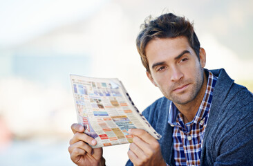 Poster - Thinking, newspaper and man in outdoor for search, job hunting and serious. Newsletter, thought and male person with ideas, decision and consideration in planning for employment opportunities